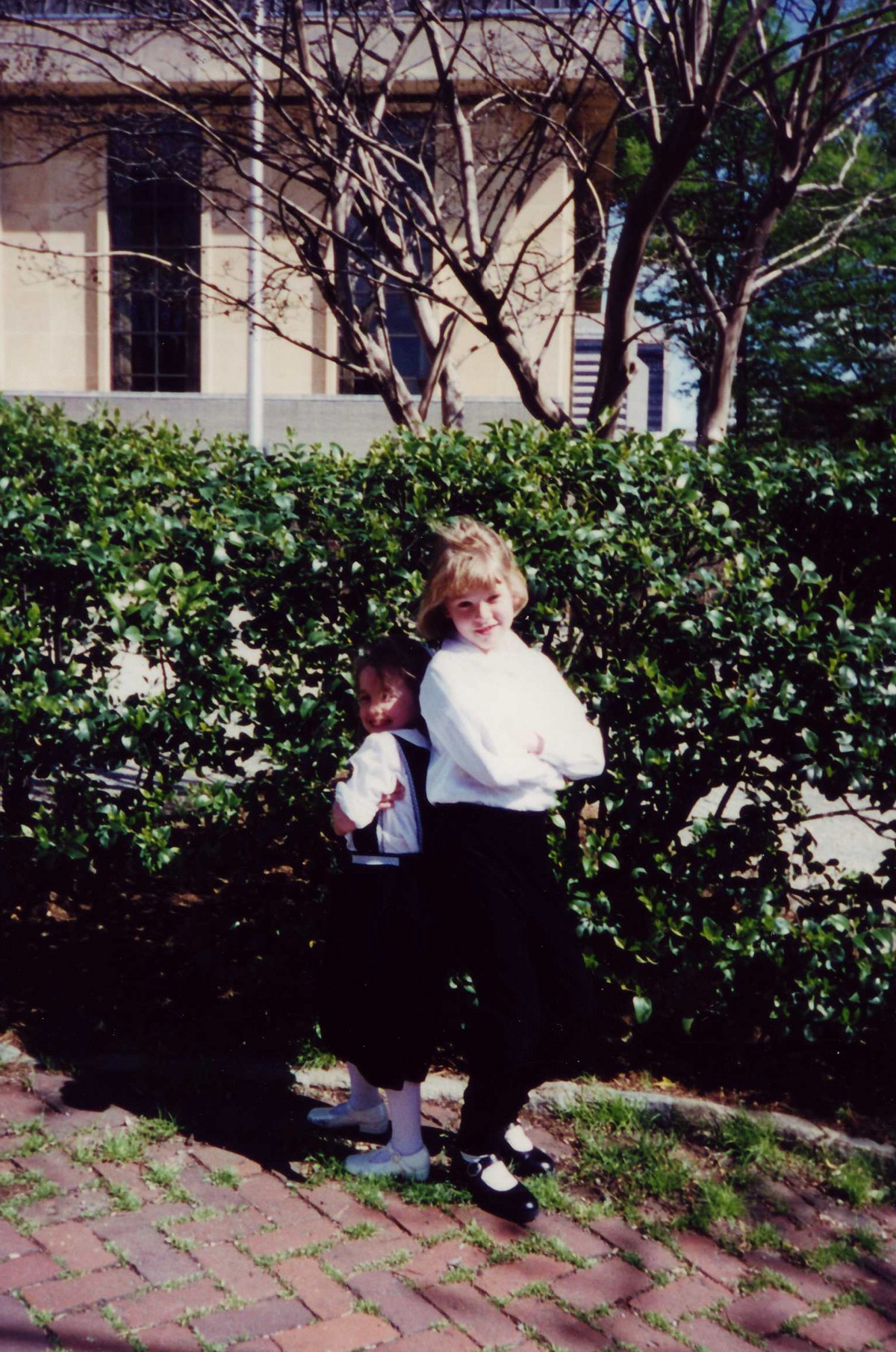 a photo of me and my sister in front of the Richmond Public Library